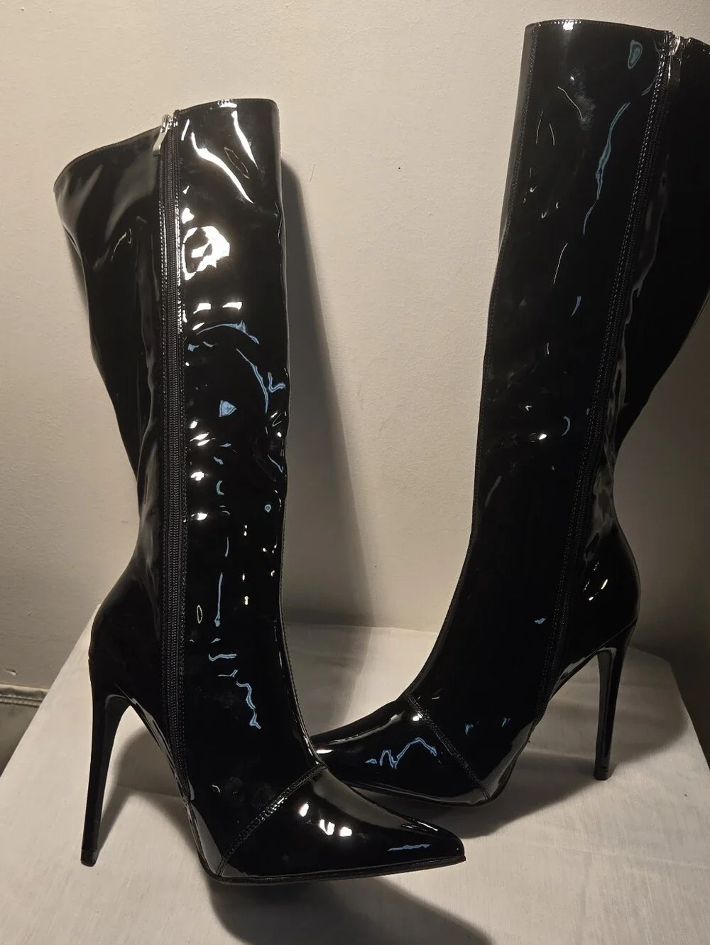 Fashion Nova Black Patent Pointed Toe Knee-High Stiletto Boots.
